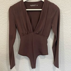 NWT Mauve V-Neck Bodysuit